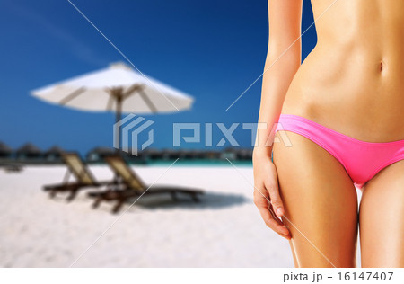 Woman on beautiful beach at Maldives Woman on beautiful beach at Maldives 16147407
