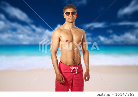 Man on Anse Intendance beach at Seychelles Man on Anse Intendance beach at Seychelles 16147565