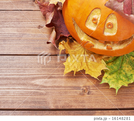 Happy jack o lantern pumpkin composition 16148281