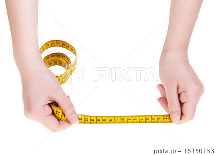 female hands with tailor measuring tape isolated female hands with tailor measuring tape isolated 16150153