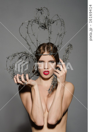 Iron lady with symbols of power 16169414