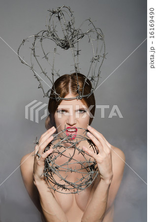 Queen with metal symbols of power 16169490