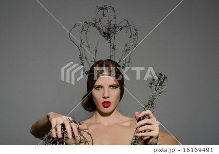 Woman with symbols power of barbed wire Woman with symbols power of barbed wire 16169491