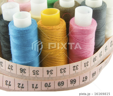 Many colorful threads with centimeters over background Many colorful threads with centimeters over background 16169815