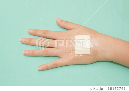 Adhesive waterproof plaster on hand Adhesive waterproof plaster on hand 16172741