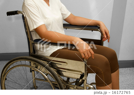 woman in a wheelchair woman in a wheelchair 16172765