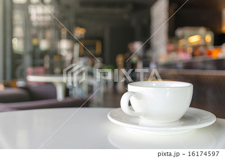 Coffee cup on coffee shop blur background 16174597