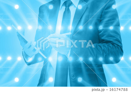Double exposure of businessman with concert lighting from the st 16174788