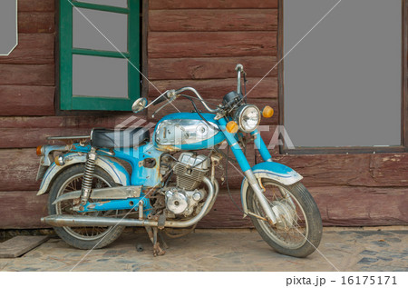 Vintage motorcycle on wood background Vintage motorcycle on wood background 16175171
