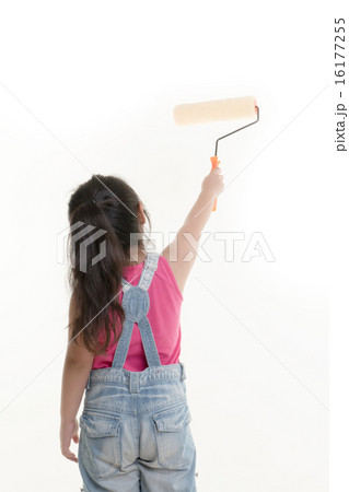 Little Asian child painting the wall on isolated 16177255