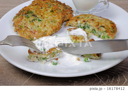 Fritters of zucchini and peas Fritters of zucchini and peas 16178412