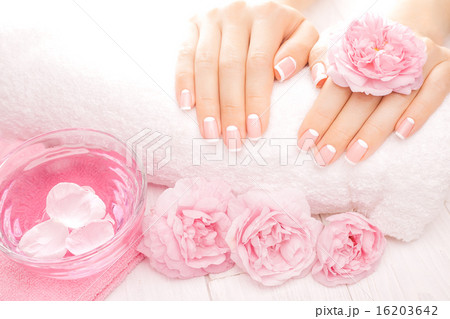 french manicure with rose flowers. spa 16203642