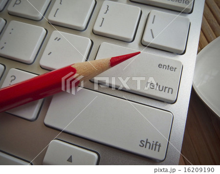 Pencil on keyboard buttons 16209190