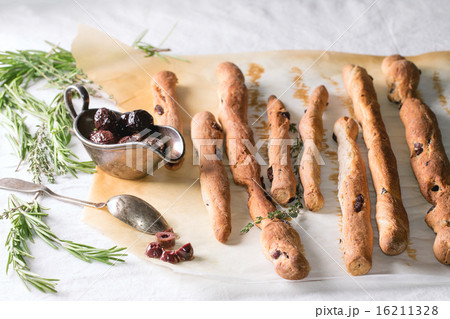 Black olives and grissini bread Black olives and grissini bread 16211328