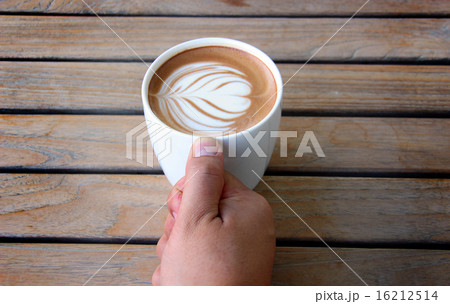 hand hold coffee latte hand hold coffee latte 16212514