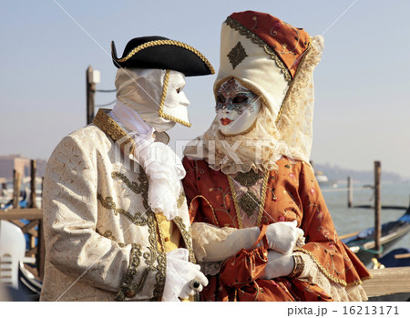 people in Venetian mask during Venice Carnival people in Venetian mask during Venice Carnival 16213171