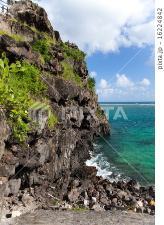 Black stones in the sea. Mauritius Black stones in the sea. Mauritius 16224842