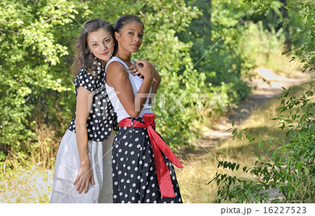 Two romantic girl surrounded by leaves 16227523