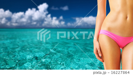 Woman on tropical beach at Maldives 16227864