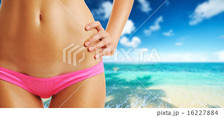 Woman on beautiful beach at Seychelles 16227884
