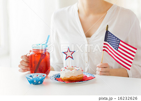 woman celebrating american independence day woman celebrating american independence day 16232626