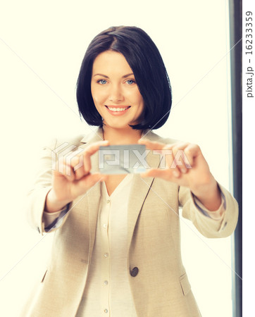 happy woman with credit card 16233359