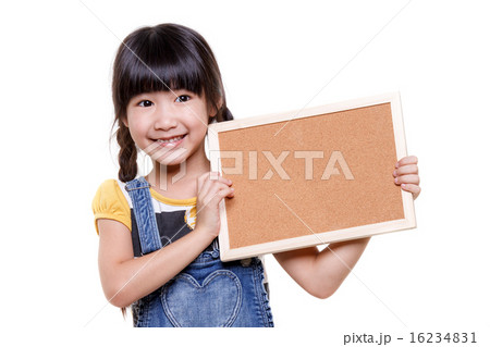 Little Asian child holding empty board Little Asian child holding empty board 16234831
