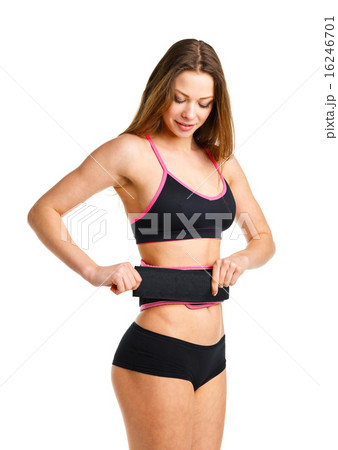 Happy young athletic woman doing sport exercise Happy young athletic woman doing sport exercise 16246701
