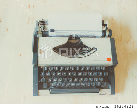 Old Typewriter on wooden table. Old Typewriter on wooden table. 16254322