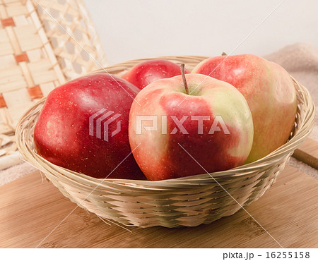 apples in a wicker basket apples in a wicker basket 16255158