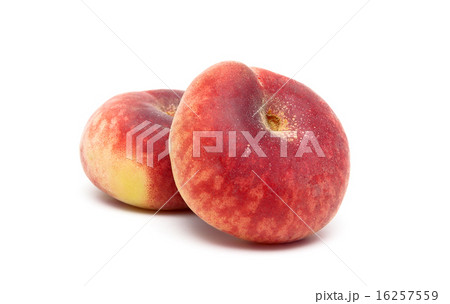ripe peaches close-up on a white background 16257559