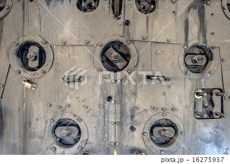 Industrial worn metal closeup photo 16275937