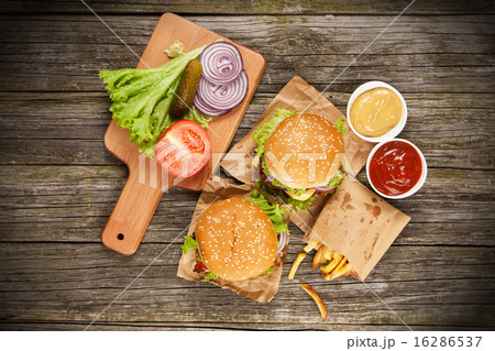 Delicious hamburger and fries Delicious hamburger and fries 16286537