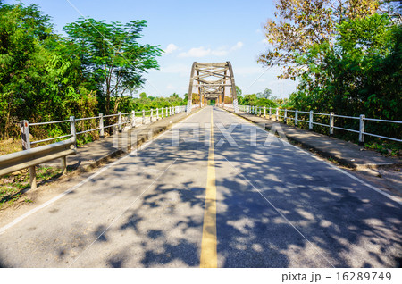 Historical bridge over the river with shadow 16289749
