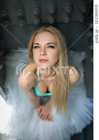 Portrait of graceful ballerina in the industrial background 16296609