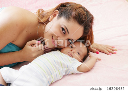 Portrait of mother with her baby Portrait of mother with her baby 16298485