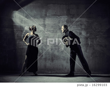 Man and woman dancers, concrete building surroundings Man and woman dancers, concrete building surroundings 16299103
