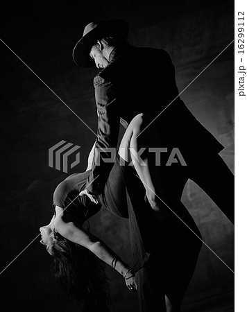 Man and woman dancing, concrete building surroundings Man and woman dancing, concrete building surroundings 16299112