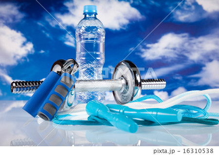 Fitness, dumbbell and blue sky Fitness, dumbbell and blue sky 16310538