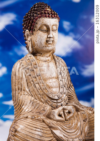 Buddha statue with orchid flower 16312009