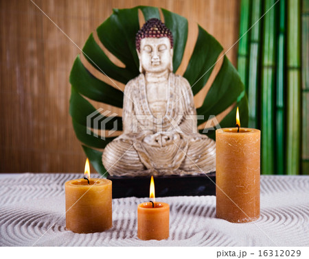 Buddha statue with orchid flower 16312029