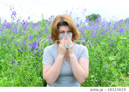 adult woman with allergies on the Meadow adult woman with allergies on the Meadow 16323629