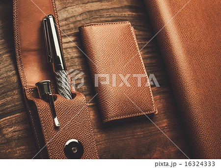 Luxurious rollerball pen on a wooden background 16324333