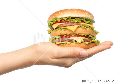 Hand holds big hamburger on white background 16326512