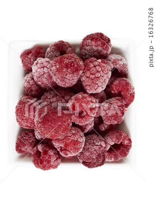 Frozen raspberries in a white porcelain dish 16326768