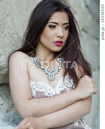 Portrait of beautiful woman is wearing fashion lace dress Portrait of beautiful woman is wearing fashion lace dress 16336520