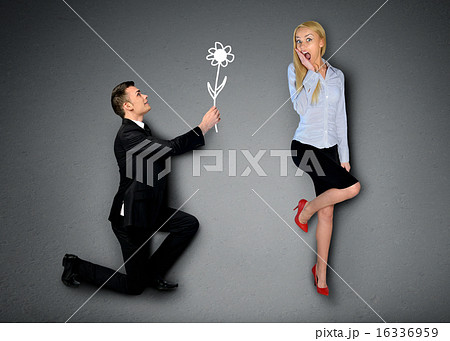 Business man giving flower to girlfriend 16336959