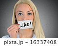 Woman holding card with Like word 16337408