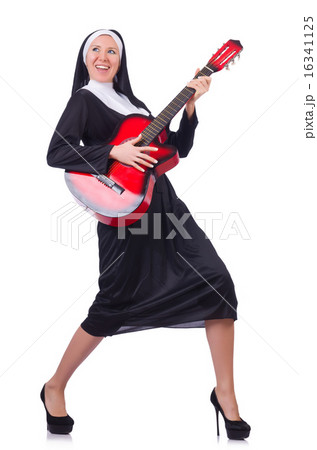 Nun playing guitar isolated on white 16341125