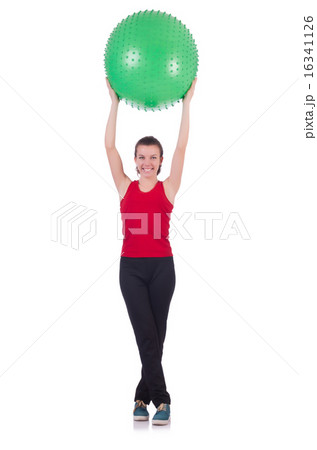 Young woman with ball exercising on white 16341126